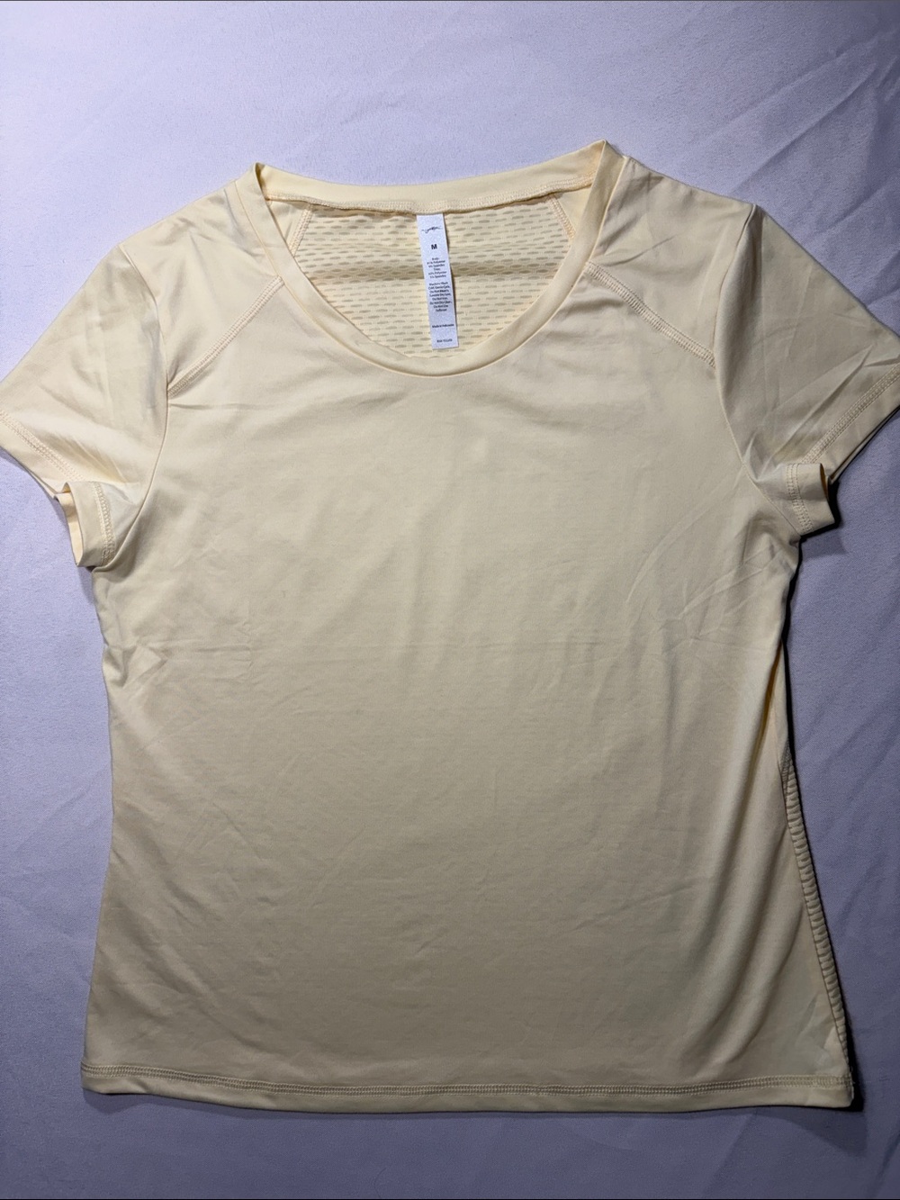 Gottex Light Yellow Short Sleeve Performance Tee with Mesh back.